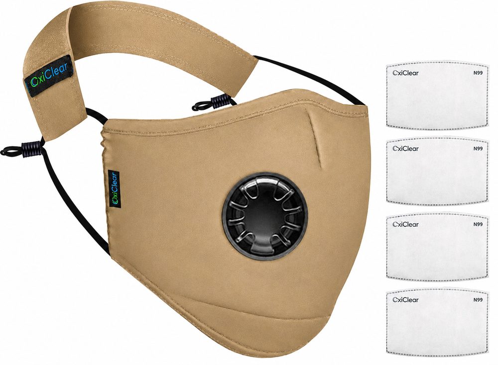 An OxiClear N99 mask with valve in khaki, beside four replacement filters